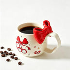 DTIUYIOP-Kawaii Red Bow Cherry Cat Ceramic Coffee Mug with 3D Red Bow and Bow Spoon, Large Curved Handle Cute Kitty Tea Cup, Coquette Aesthetic Gift for Women Girls Birthday Valentine’s Day Christmas