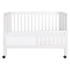 Babyletto Maki Full-Size 2-in-1 Portable Folding Crib with Toddler Bed Conversion Kit in White, Greenguard Gold Certified
