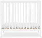 Delta Children Mia Portable Folding Mini Crib with 1.5-Inch Mattress - Greenguard Gold Certified, Bianca White