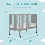 Quinn Full-Size Folding Crib in Cool Grey, Removeable Wheels, Modern Nursey, Adjustable Mattress Support, Portable Crib, Patented Folding System