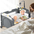 5 in 1 Infant Newborn Baby Crib,Baby Bassinet Bedside Cribs,Pack and Play with Bassinet and Changing Table,Portable Travel Baby Playpen with Bassinet Toys & Music Box,Portable Travel Crib,Dark Gray