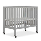 Jett Non-Full Size Folding Convertible Crib, Lightweight Portable Crib, Three Adjustable Mattress Height Settings, Easy to Fold Travel Crib, 1.5” Mattress Pad Included