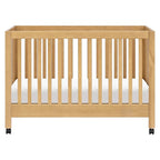Babyletto Maki Full-Size 2-in-1 Portable Folding Crib with Toddler Bed Conversion Kit in Honey, Greenguard Gold Certified