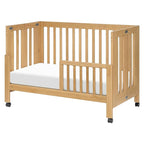 Babyletto Maki Full-Size 2-in-1 Portable Folding Crib with Toddler Bed Conversion Kit in Honey, Greenguard Gold Certified