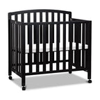 DaVinci Dylan Folding Portable 3-in-1 Convertible Mini Crib and Twin Bed in Ebony, Greenguard Gold Certified