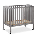 3 in 1 Portable Folding Stationary Side Crib in Steel Grey, Greenguard Gold Certified, Safety Wheels with Locking Casters, Convertible, 3 Mattress Heights