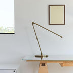 Brightech Libra LED Table Lamp - Contemporary Minimalist Thin Compact Desk Lamp - Adjustable Pivoting LED Head with Built-in Dimmer and Color Changing LED - Brass