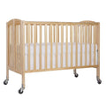 Folding Full Size Convenience Crib In Natural, Two Adjustable Mattress Height Positions, Comes With Heavy Duty Locking Wheels, Flat Folding