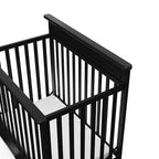 Storkcraft Petal 4-in-1 Convertible Mini Crib (Black) – GREENGUARD Gold Certified, Converts to Daybed and Twin-Size Bed, includes Bonus 2.75-inch Mini Crib Mattress