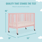 Quinn Full-Size Folding Crib in Blush Pink, Removeable Wheels, Modern Nursey, Adjustable Mattress Support, Portable Crib, Patented Folding System