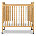 DaVinci Jenny Lind 3-in-1 Convertible Mini Crib in Honey, Removable Wheels, Greenguard Gold Certified