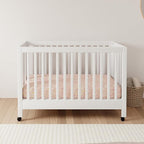 Babyletto Maki Full-Size 2-in-1 Portable Folding Crib with Toddler Bed Conversion Kit in White, Greenguard Gold Certified
